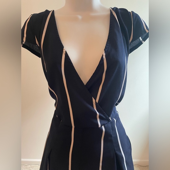 Very cute navy blue with white stripes romper. - Picture 2 of 2
